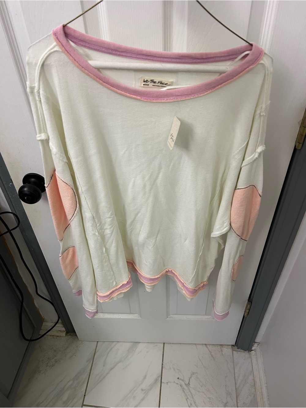 NWT FREE PEOPLE heart ❤️ sleeve long sleeve top.